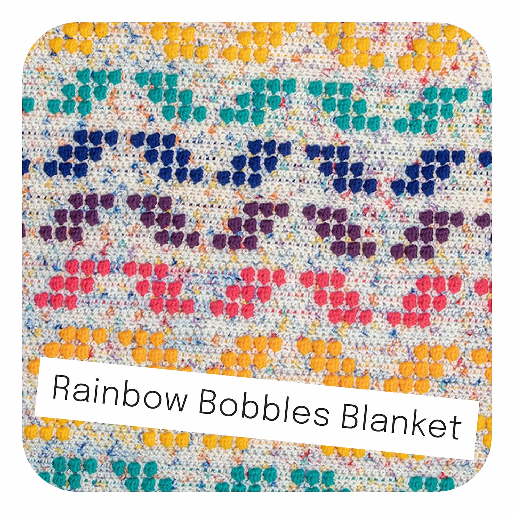 Image: A crocheted rainbow blanket. Text: Rainbow Bobbles Blanket. >>