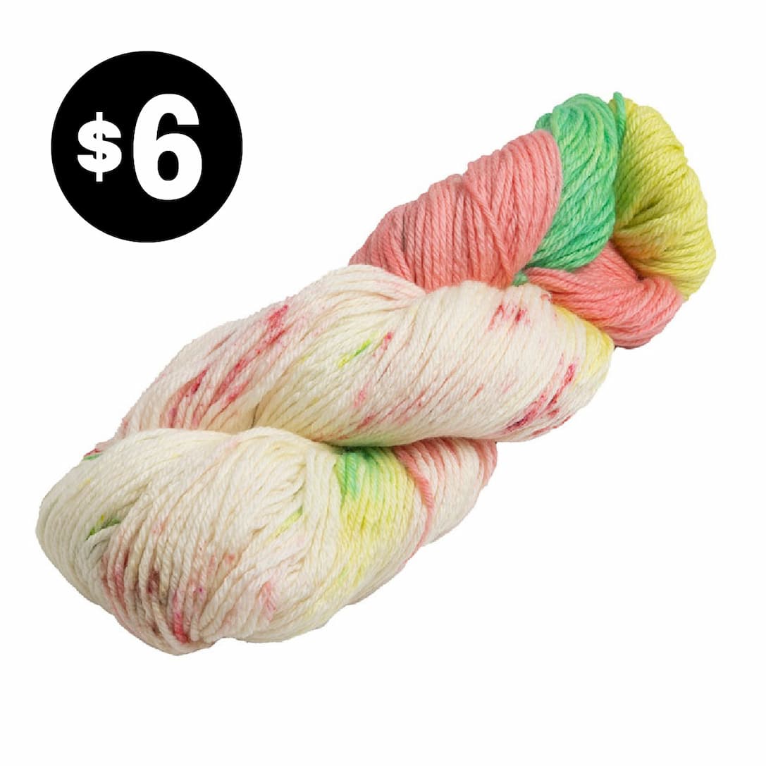 Image: A skein of cream, coal, green, and yellow yarn. Text: $6 >>
