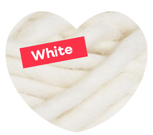 A close up shot of white yarn. White