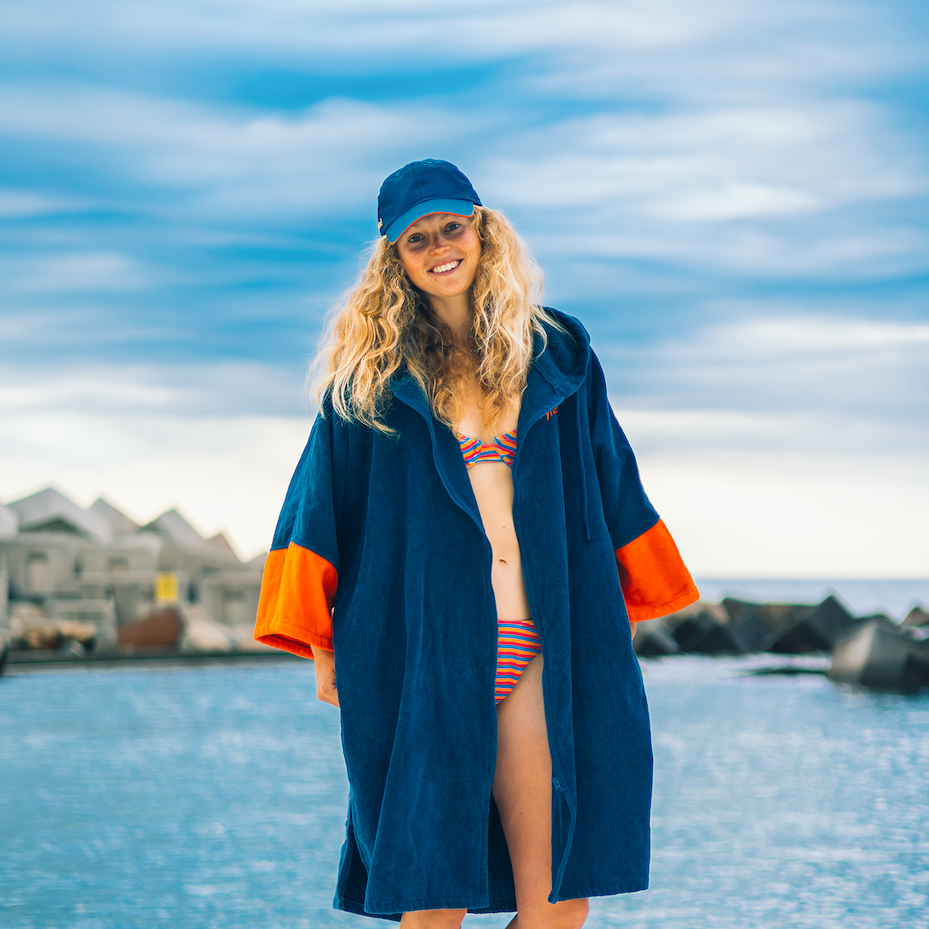 Woman wearing Deep Sea Blue full-zip towel robe