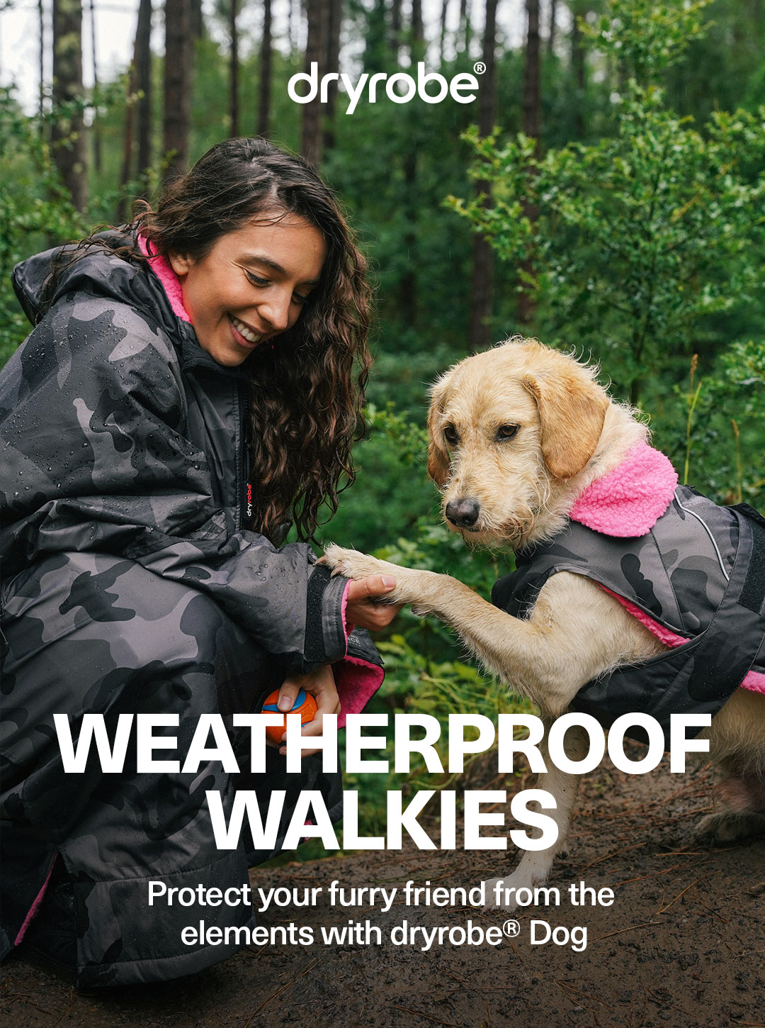 Woman wearing a dryrobe® with her dog in a matching dryrobe® Dog