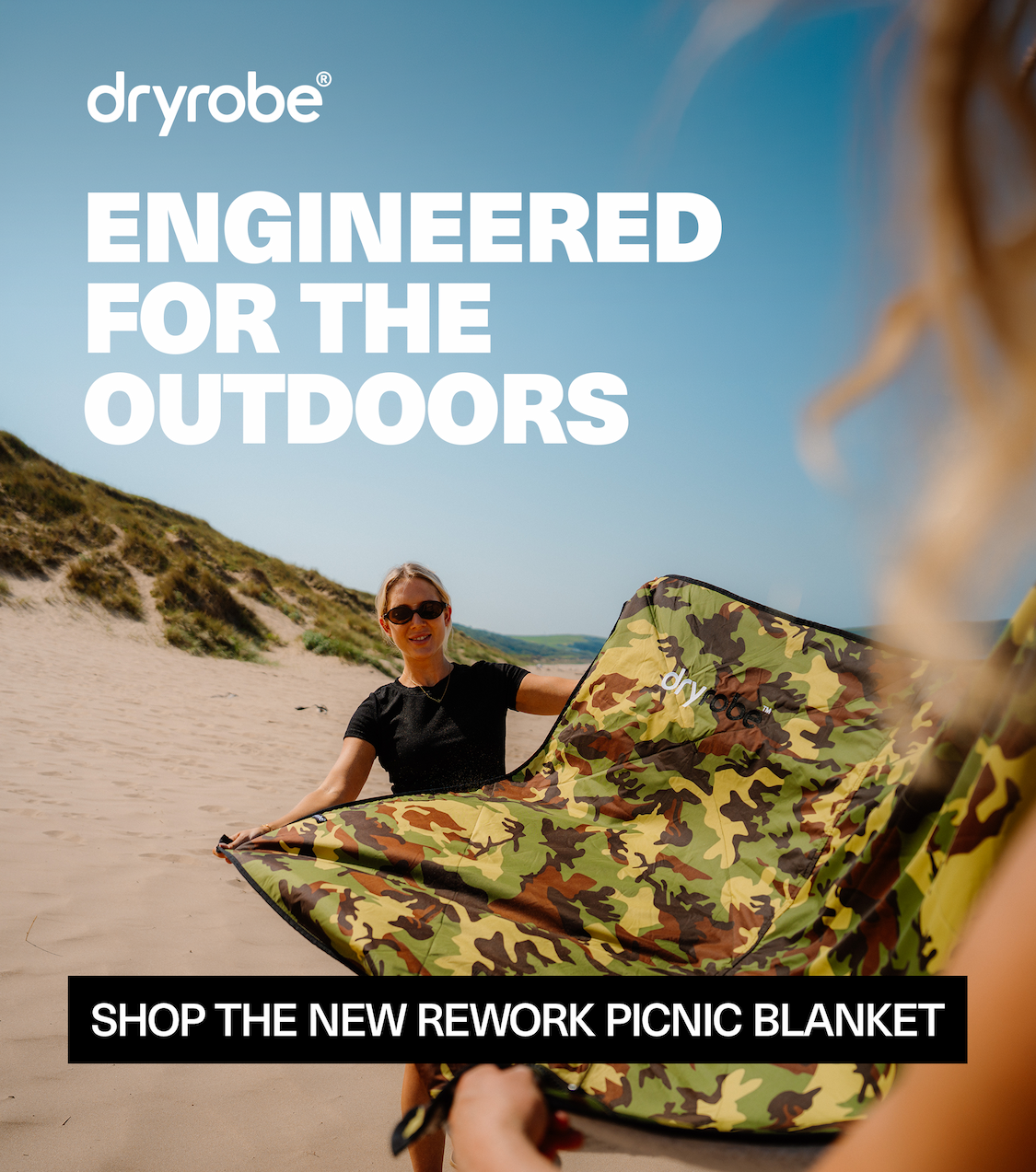 Woman Folding REWORK Large Picnic Blanket on the Beach