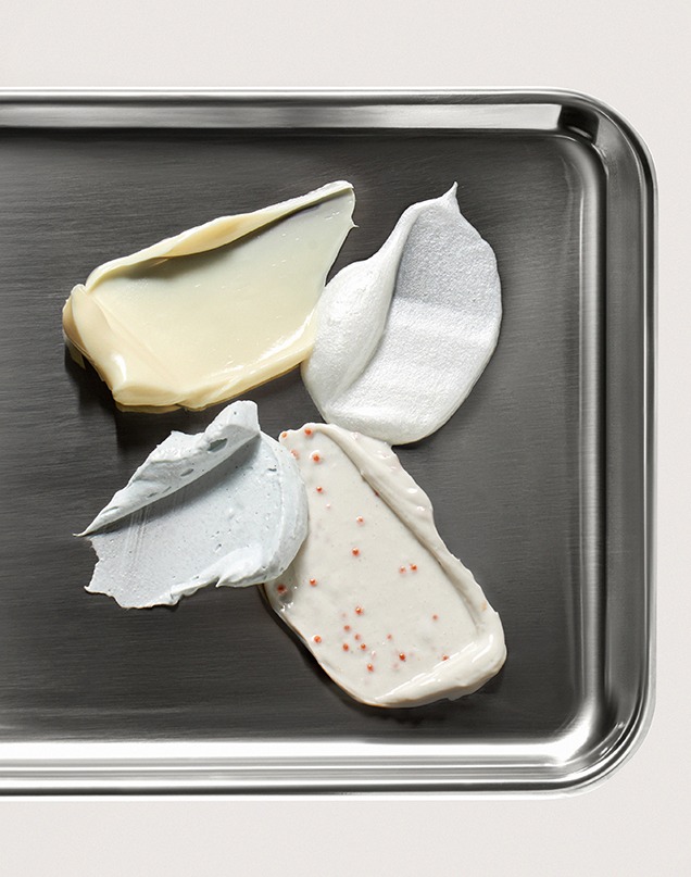 Swatches of DRMTLGY creams on a tray - Shop now