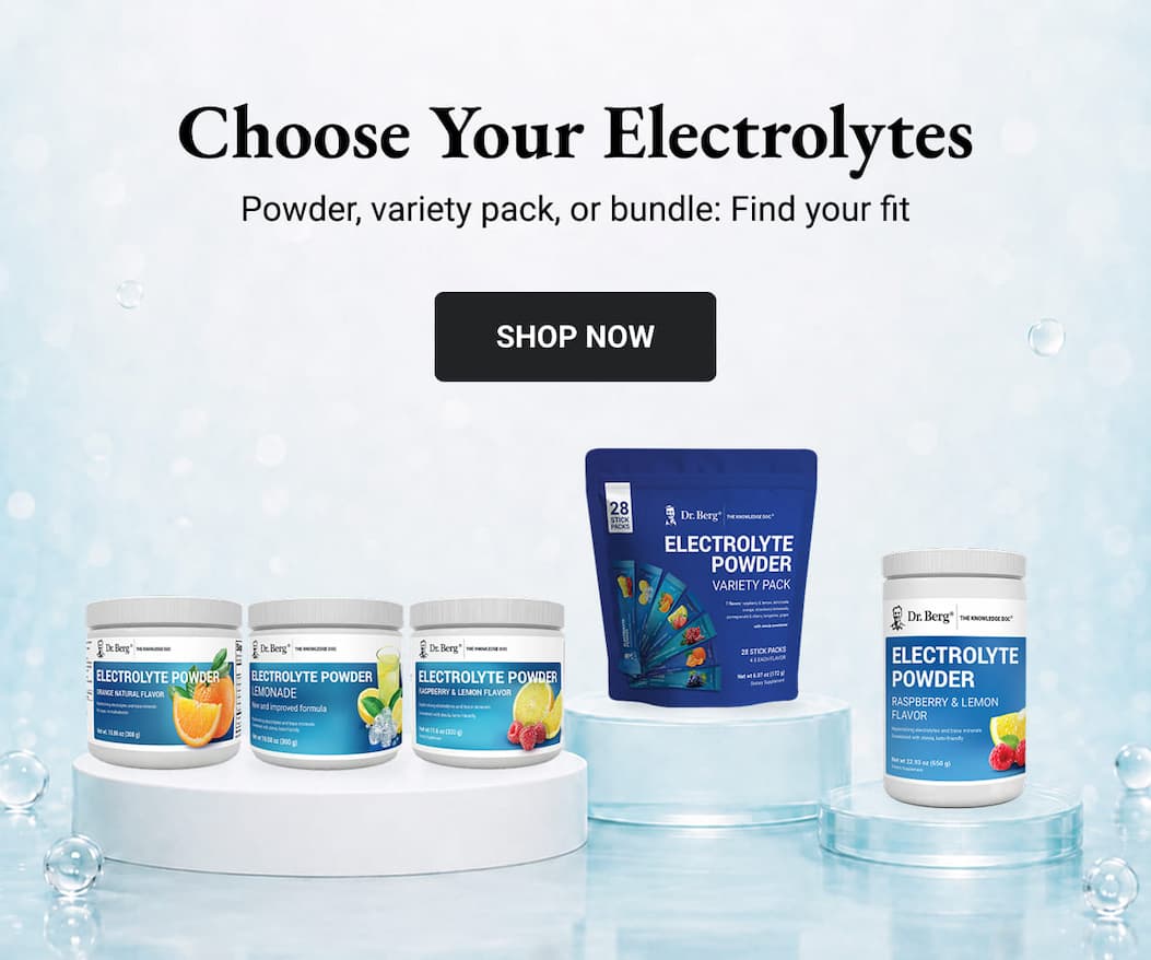 Dr. Berg electrolyte powders and a variety pack arranged on white and clear aqua platforms against a light blue, water-inspired background. Choose powder, variety pack, or bundle—shop now.
