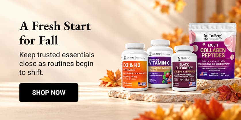 Four Dr. Berg supplements arranged on a fall-themed display with autumn leaves: D3 & K2, Vitamin C, Advanced Immune Support, and Multi Collagen Peptides.