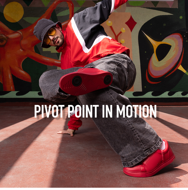 Dancer wearing red low cut sneakers