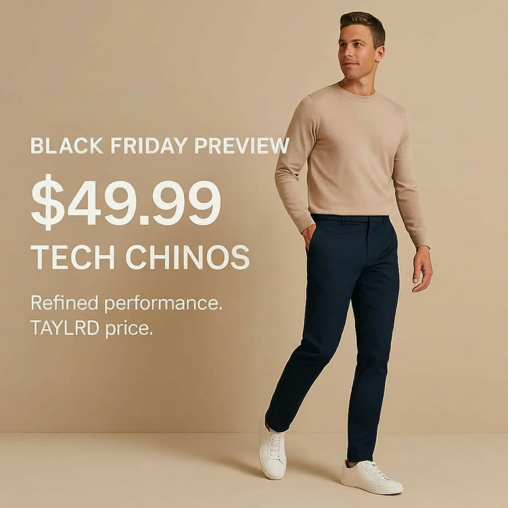 an image of a man in a beige sweater and blue pants