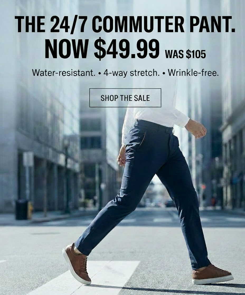 Man walking in navy commuter pants on sale for $49.99.