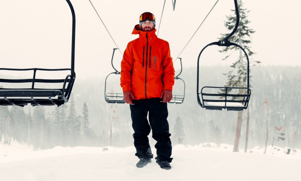 Pat Moore standing under a ski lift 