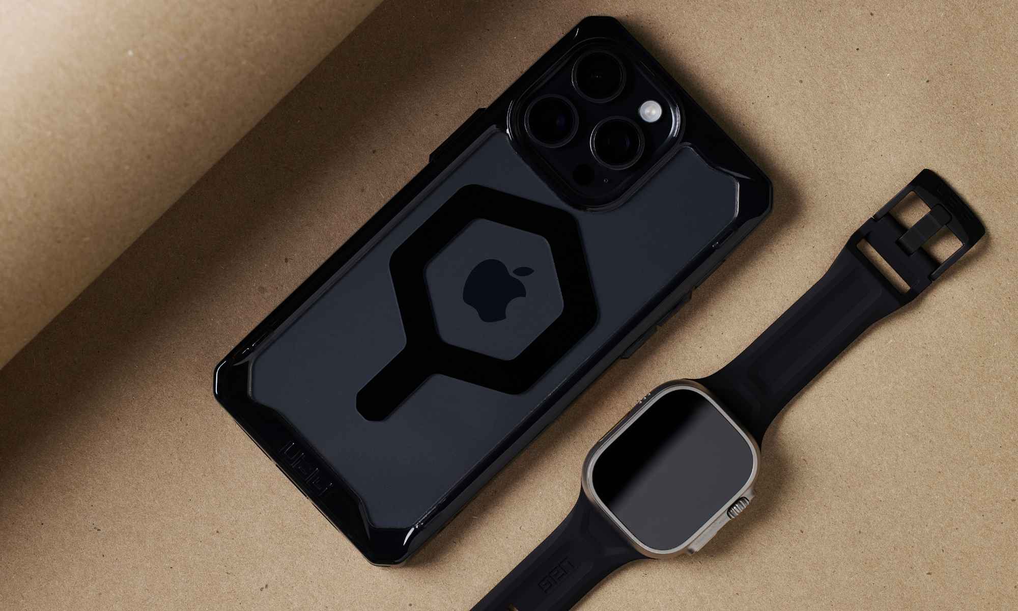 FLAT LAY OF IPHONE 15 AND APPLE WATCH