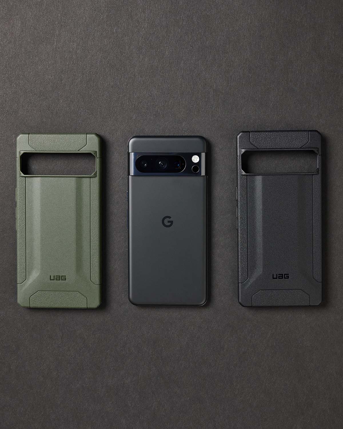 FLAT LAY OF TWO CASES AND A SINGLE PIXLE 8 PHONE BY GOOGLE