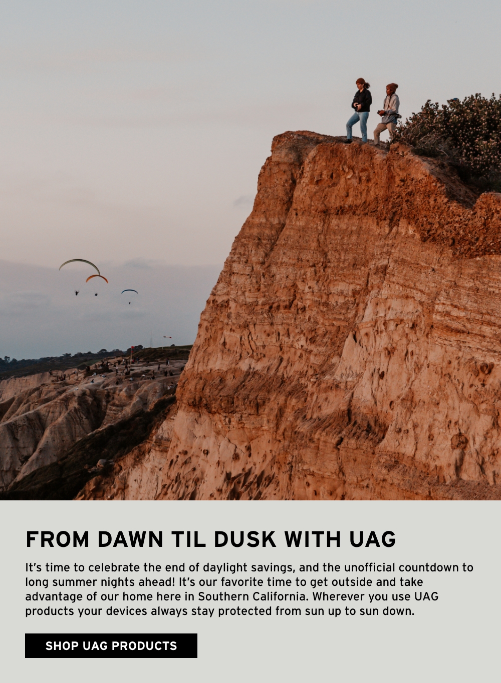 Picture of people overlooking the coast from a cliff