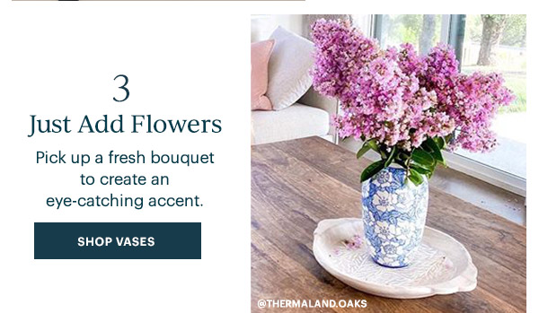 3. Just Add Flowers: Pick up a fresh bouquet to create an eye-catching accent. SHOP VASES