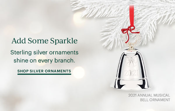 Add Some Sparkle: Sterling silver ornaments shine on every branch. SHOP SILVER ORNAMENTS