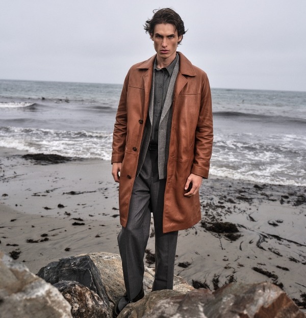 an image of a man and woman standing in a field