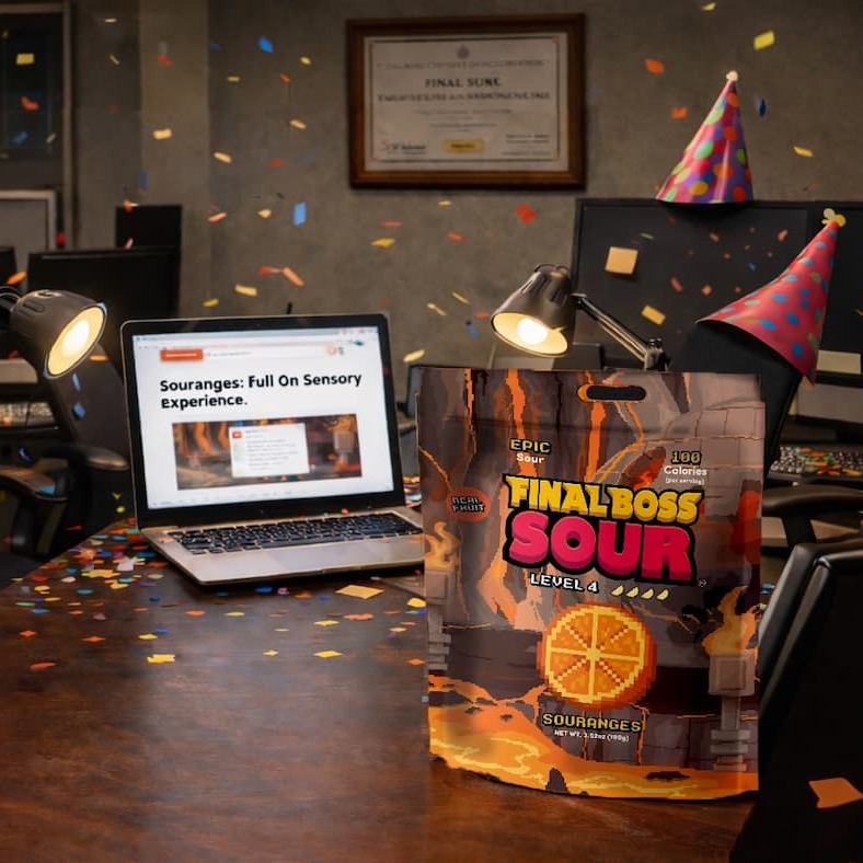 Bag of Souranges wearing a party hat