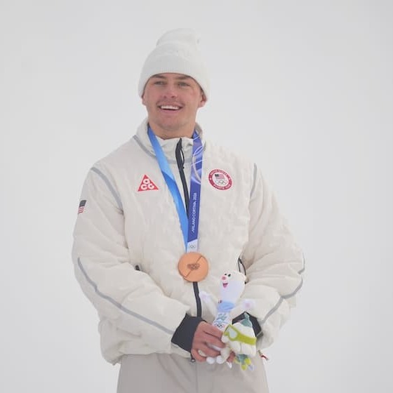 Jake Cantor wears Olympic medal