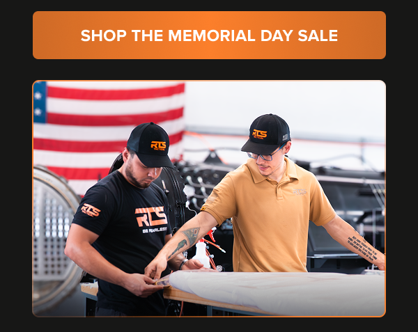 RTS Tactical manufacturing team at work in Miami factory with American flag in the background. Shop the Memorial Day Sale.