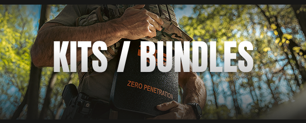 Law enforcement officer holding RTS Tactical ballistic plate labeled ZERO PENETRATION