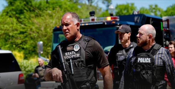 image of Officers in tactical gear ready for emergency
