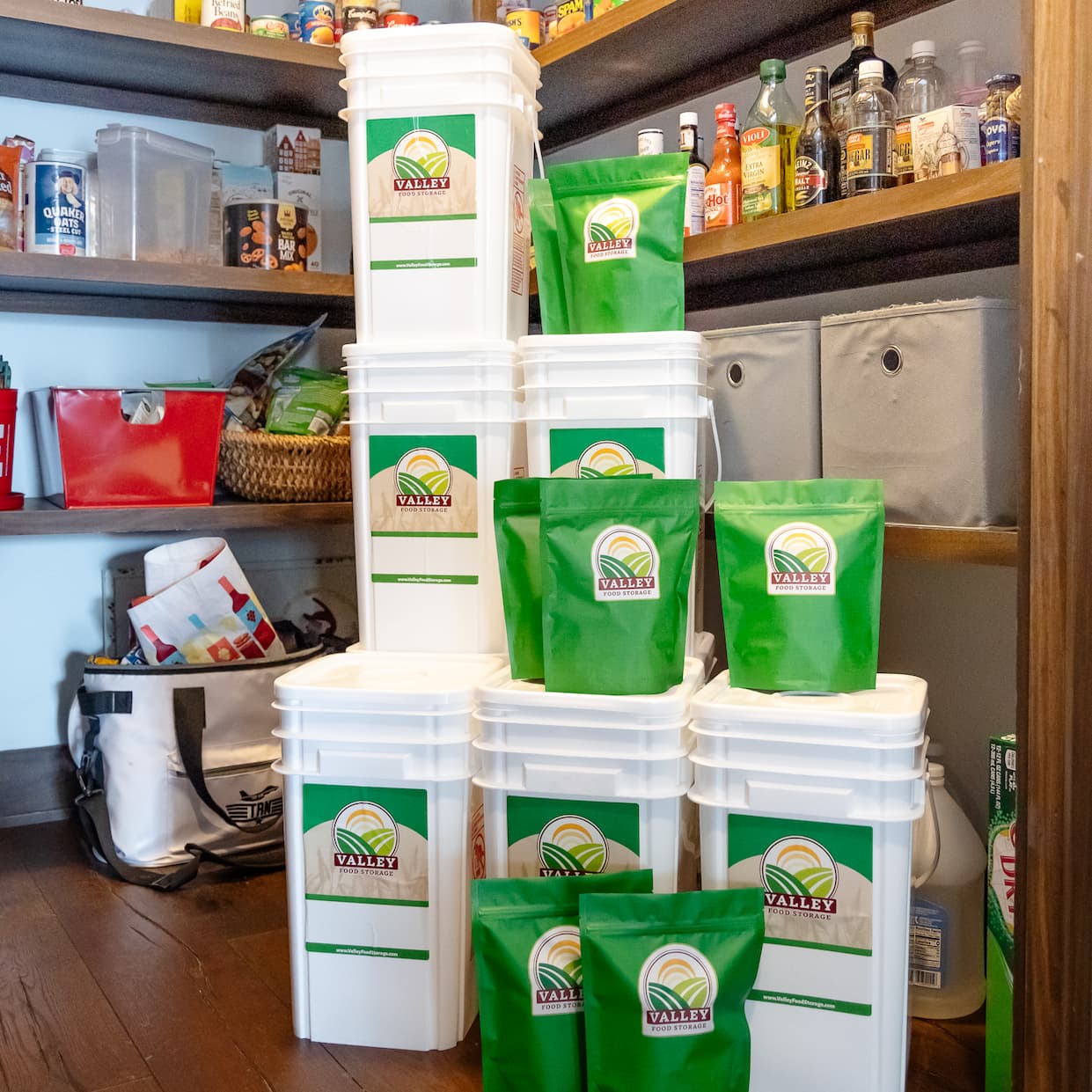 Buckets of emergency food stacked in an upscale pantry