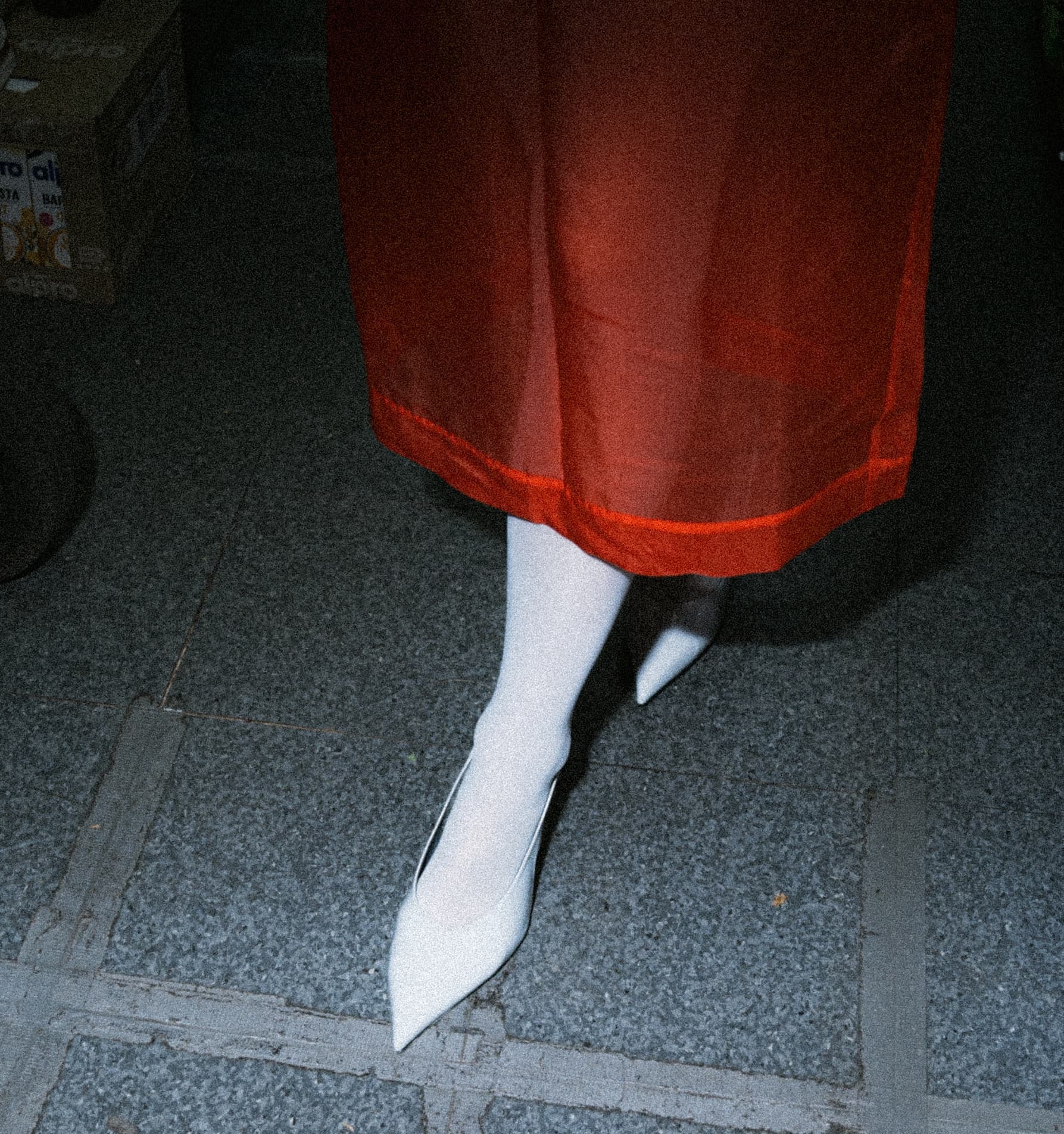 an image of a woman walking across a crosswalk with an umbrella