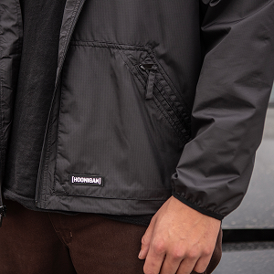 STANDARD ISSUE WINDBREAKER