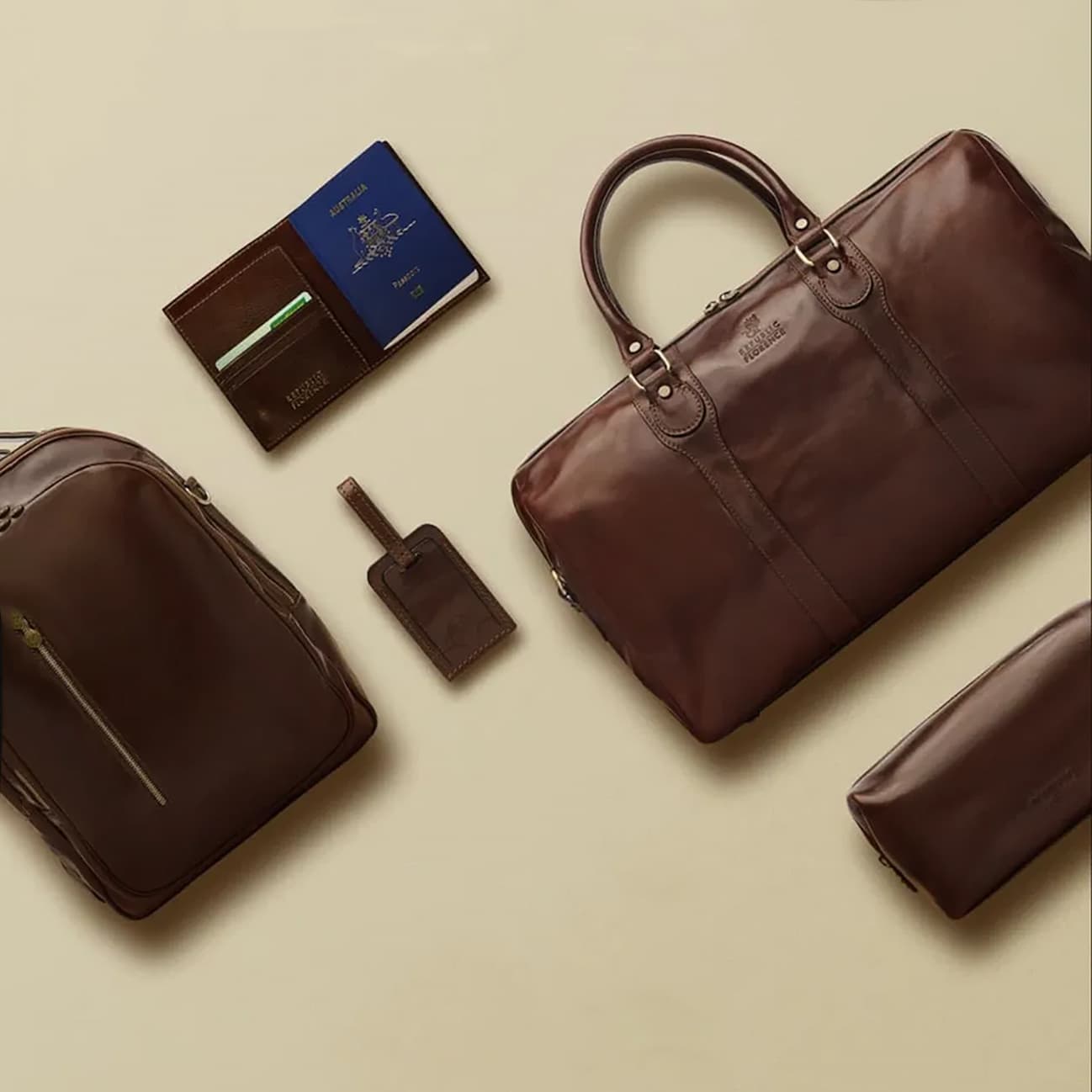 The Voyager set: leather weekender, backpack, Dopp kit, passport cover and tag.