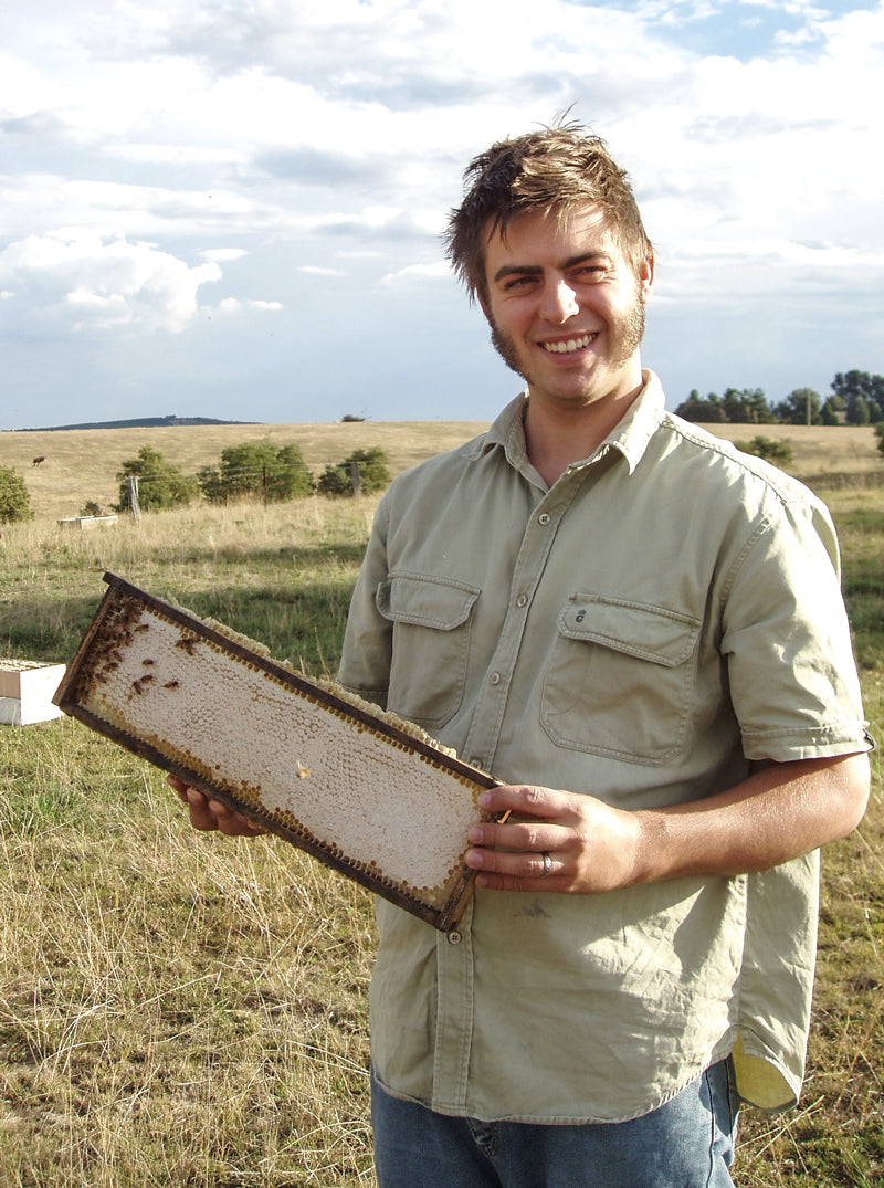 Tim Malfroy holding Langstroth Comb