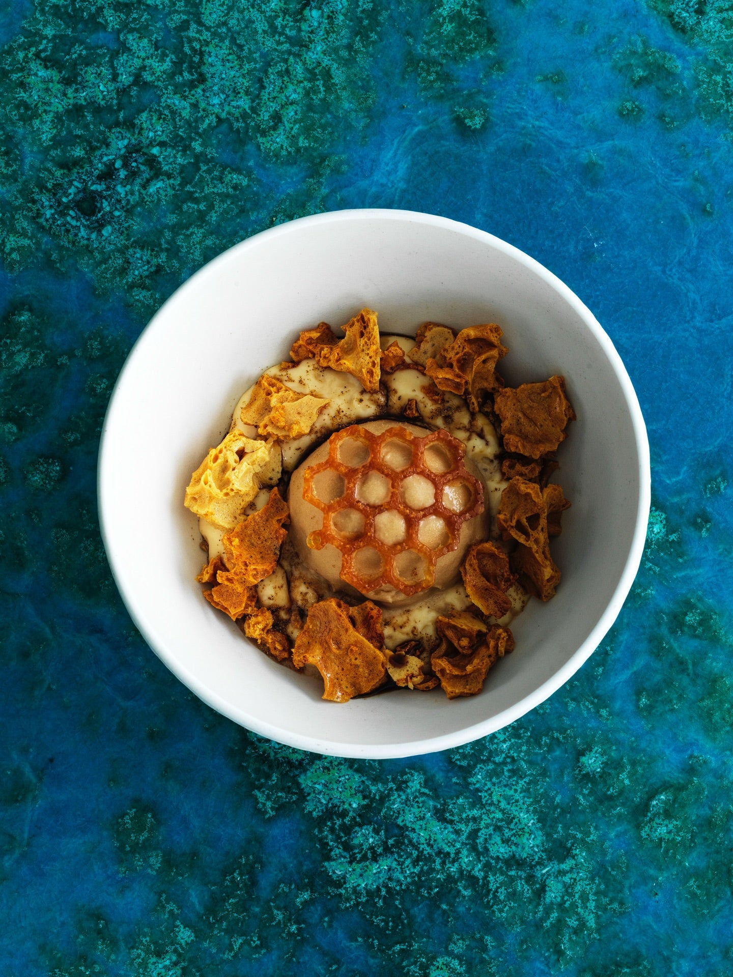 Malfroy's Gold Icebergs Layers of wild honey and propolis custard between shards of almond nougatine