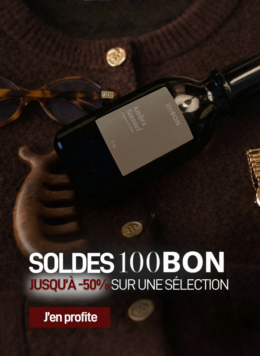 an image of a bottle of wine and a comb on a table