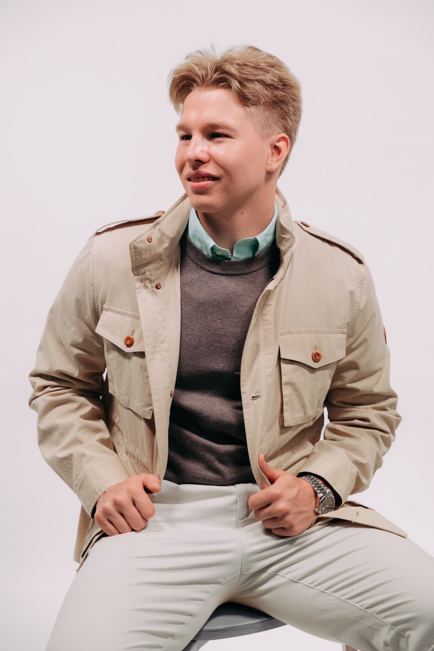 Markus rooth with green oxford with a pullover and cotton jacket