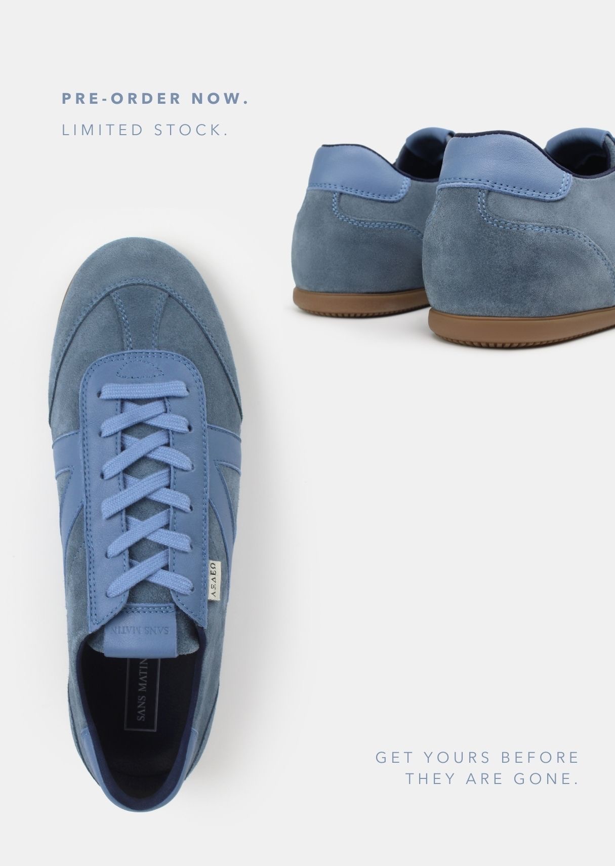an image of a pair of blue shoes with a white background