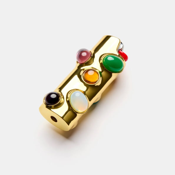 edie parker x wes anderson's phoenician scheme lighter case in gold multi-stone