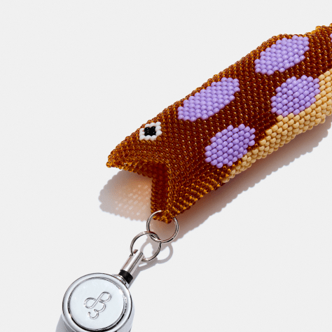 beaded fish keychain in brown