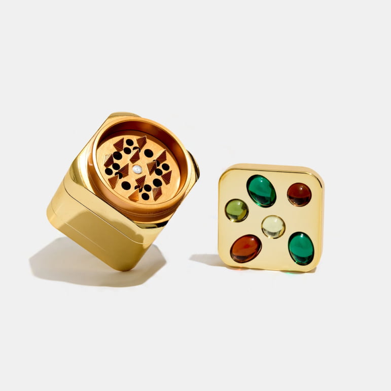 gemstoned grinder in gold