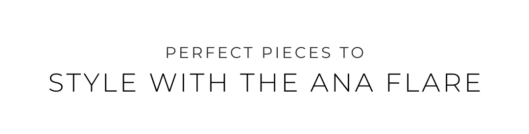 an image of a woman in a black dress with a white background