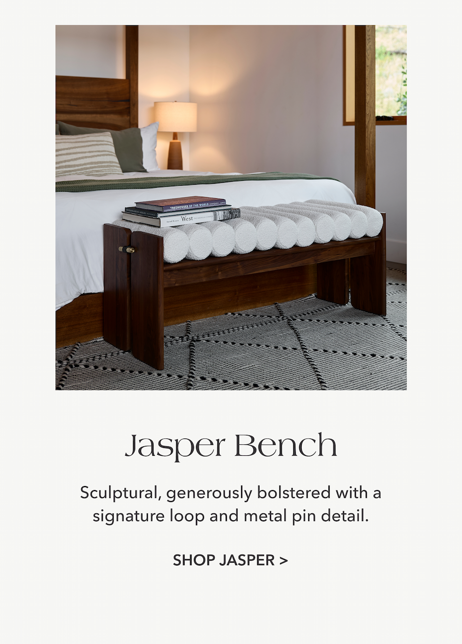 Jasper Bench — Sculptural, generously bolstered with a signature loop and metal pin detail.