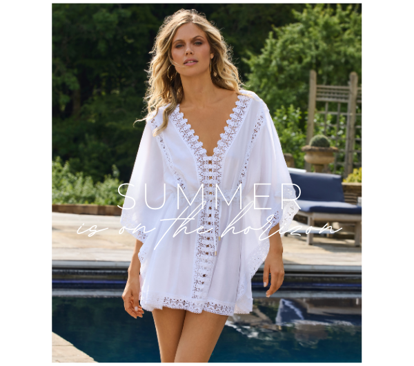 Summer is on the horizon - model wears the Evin White Kaftan