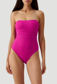 The Model is wearing the Latina Swimsuit in Raspberry
