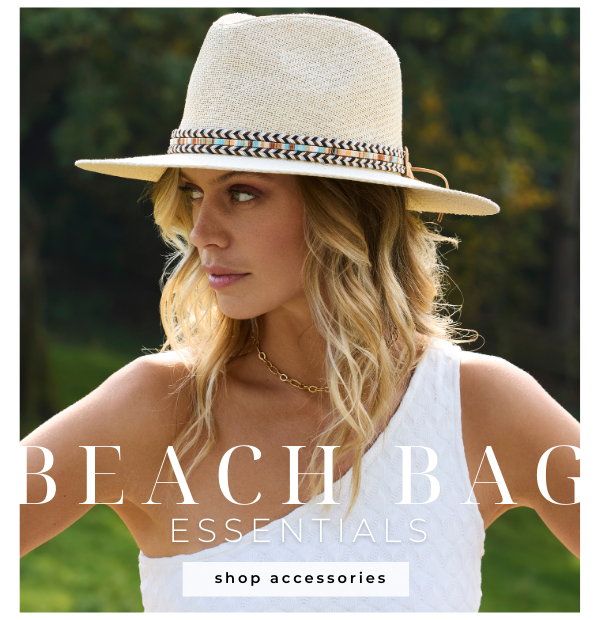 Beach Bag essentials - model wears Kate Hat