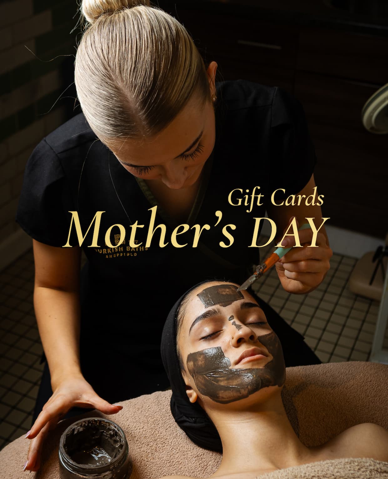 an image of a woman getting a facial mask on her face