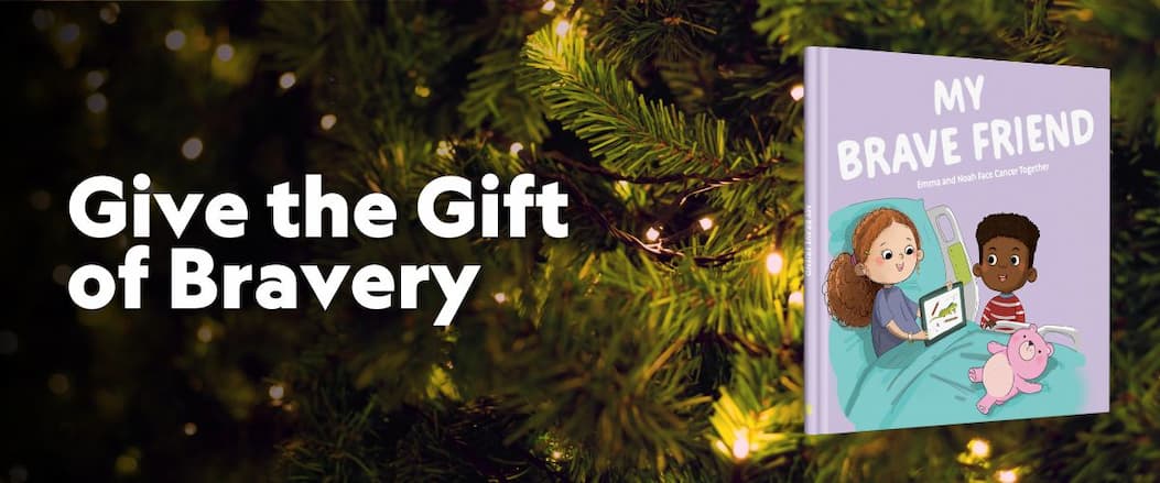 Children's book cover in front of a Christmas tree