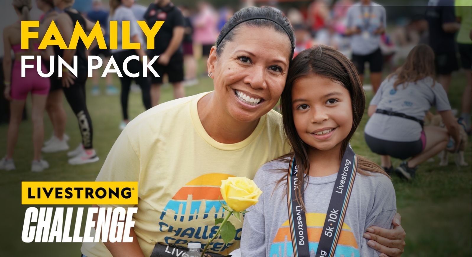 A mother and daughter smile after finishing a race