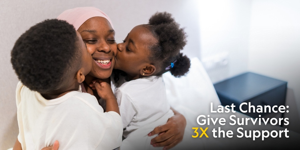 Two children kissing their mother