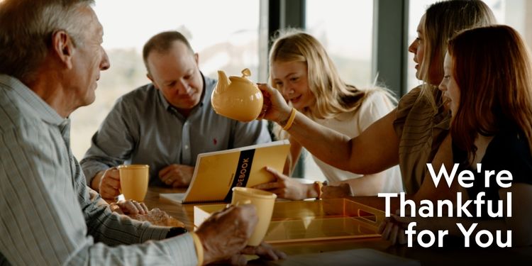 A family gathering around a table