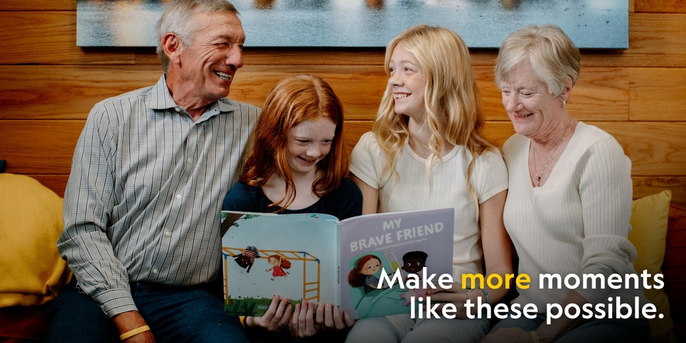 Family reading a book together