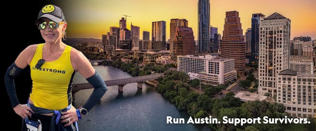 A woman in running gear in front of Austin city skyline