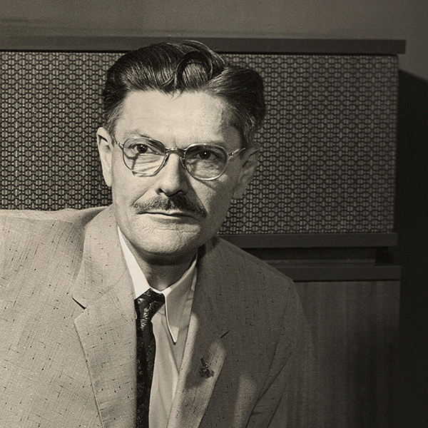 Vintage image of Paul W. Klipsch in front of original Klipschorn