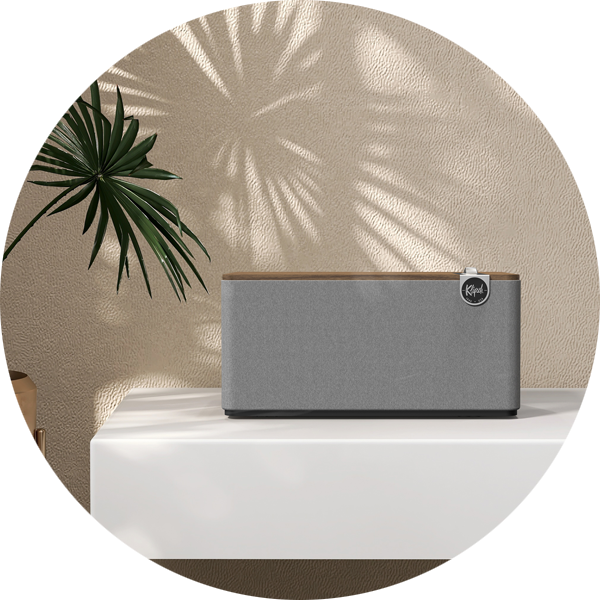 Tuck a stylish tabletop speaker into any corner of the house